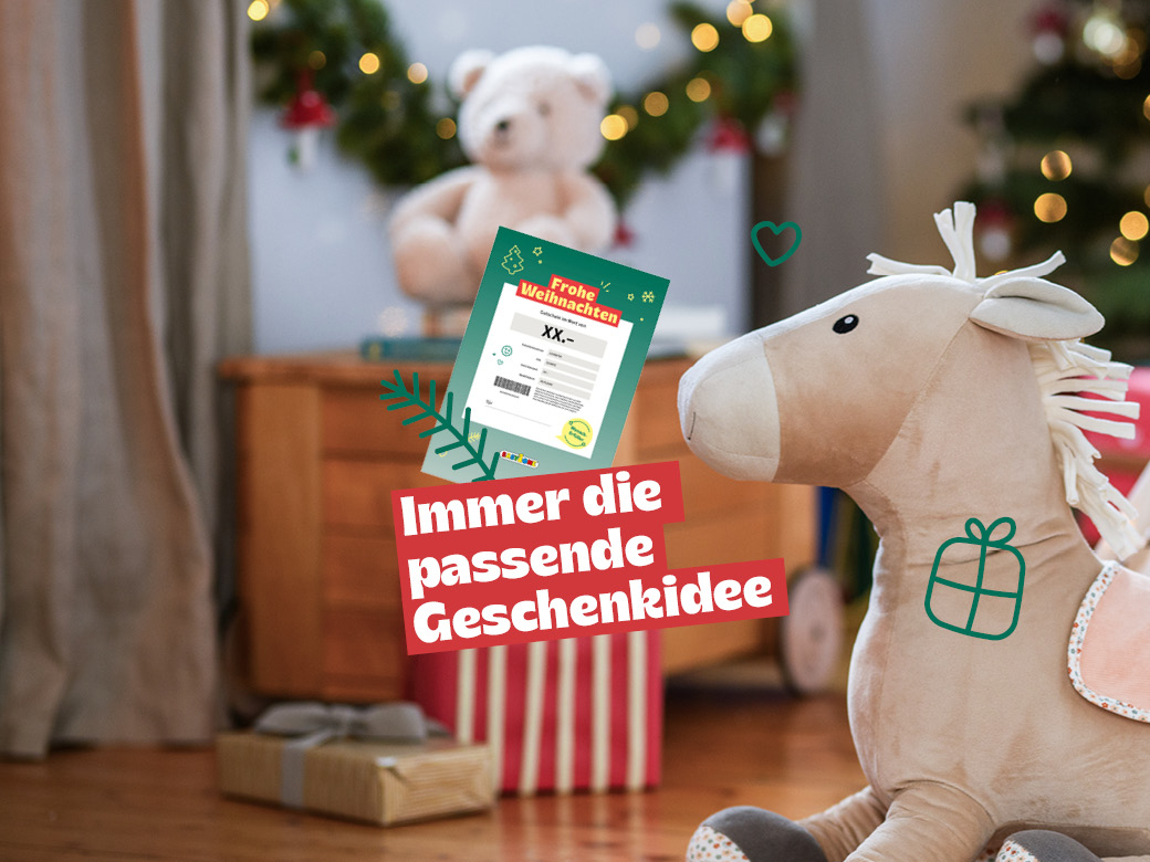 Immer die passende Geschenkidee: Geschengutschein abgebildet neben einem Pferdekuscheltier.