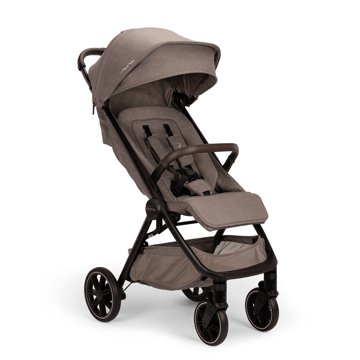 Kinderwagen ein mit einem beige stoffbezug darauf.