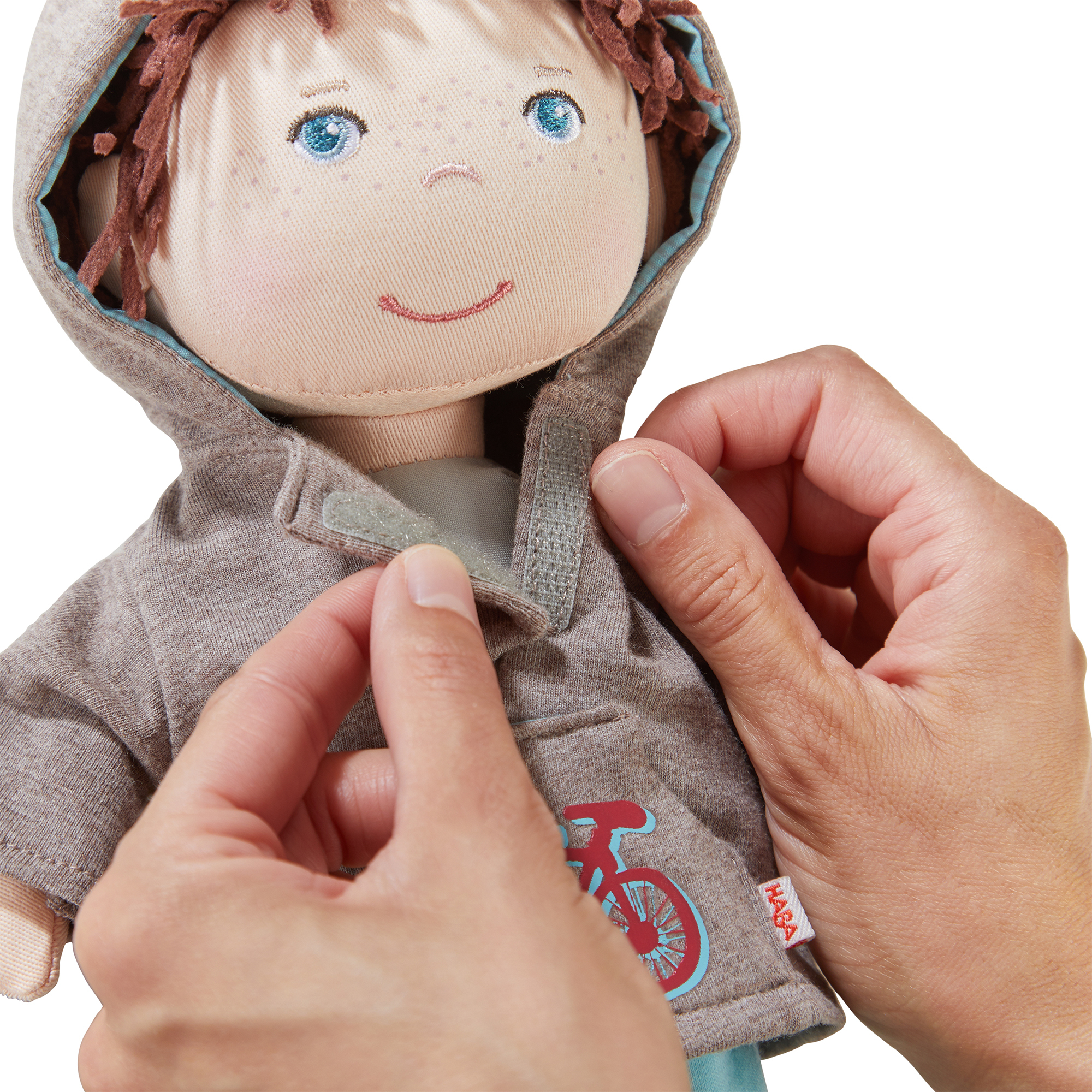 Puppen & Puppenwagen, HABA, Braun – Besonderheit: braune Haare und Sweatshirt mit Kapuze
